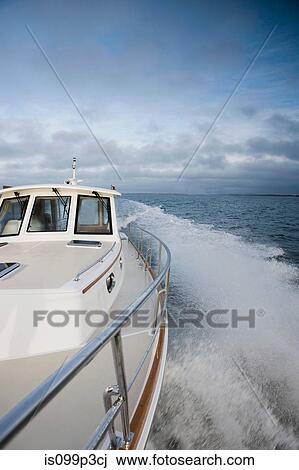 Stock Image - Power boat at sea. Fotosearch