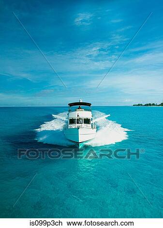 Stock Image - Power boat, front view. Fotosearch