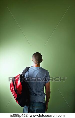 Schoolboy with backpack, rear view View Large Photo Image Stock Image - Schoolboy with backpack, rear view. Fotosearch