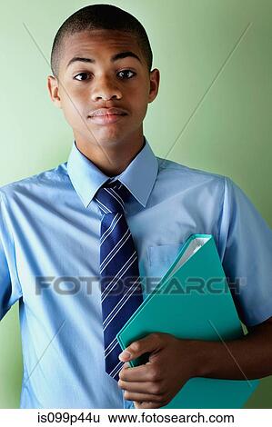 Schoolboy with ringbinder View Large Photo Image Stock Photograph - Schoolboy with ringbinder. Fotosearch