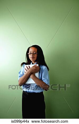 Stock Photo - Schoolgirl with digital tablet. Fotosearch