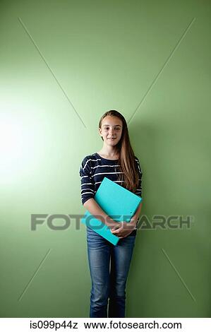 Schoolgirl with ringbinder View Large Photo Image Stock Photo - Schoolgirl with ringbinder. Fotosearch