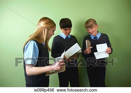 Three friends opening exam results View Large Photo Image Stock Photograph - Three friends opening exam results. Fotosearch