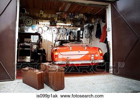 Vintage car and trunk suitcases in garage View Large Photo Image Stock Image - Vintage car and trunk suitcases in garage. Fotosearch
