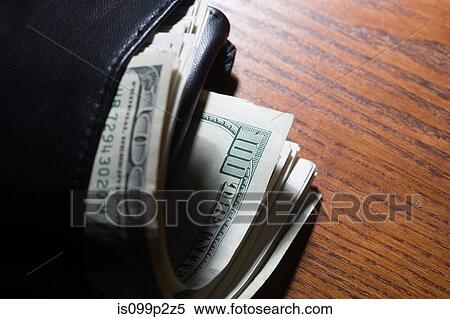 Wallet with 100 dollar banknotes View Large Photo Image Stock Photography - Wallet with 100 dollar banknotes. Fotosearch
