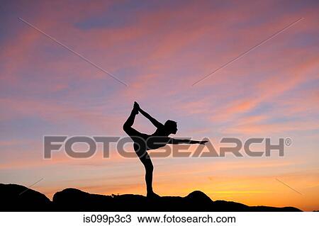 Young woman in dancer pose in desert, silhouette View Large Photo Image Stock Image - Young woman in dancer pose in desert, silhouette. Fotosearch
