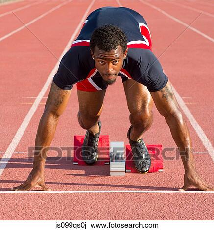 Athlete on starting blocks View Large Photo Image Stock Image - Athlete on starting blocks. Fotosearch
