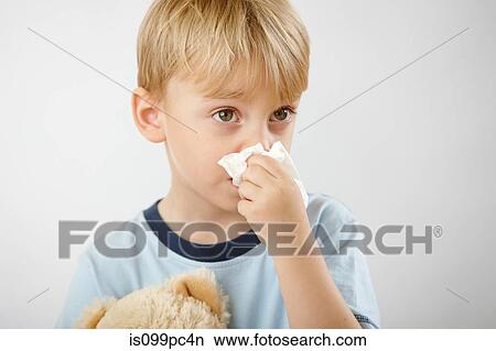 Picture - Boy with cold. Fotosearch