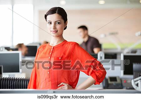 Stock Photography - Businesswoman in office. Fotosearch