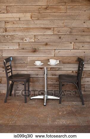 Cafe table with two empty chairs View Large Photo Image Stock Image - Cafe table with two empty chairs. Fotosearch