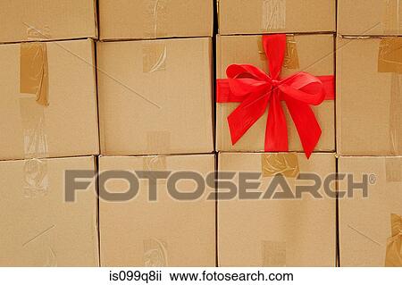 Cardboard box with red bow View Large Photo Image Stock Image - Cardboard box with red bow. Fotosearch