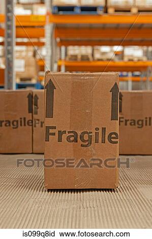Cardboard box with the word fragile printed on it View Large Photo Image Stock Image - Cardboard box with the word fragile printed on it. Fotosearch