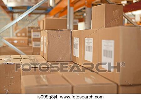 Cardboard boxes in warehouse View Large Photo Image Picture - Cardboard boxes in warehouse. Fotosearch