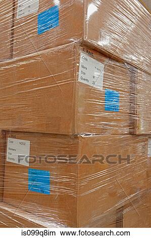 Cardboard boxes packaged in warehouse View Large Photo Image Picture - Cardboard boxes packaged in warehouse. Fotosearch