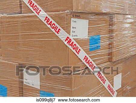 Stock Photo - Cardboard boxes packaged with tape. Fotosearch