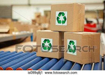 Cardboard boxes with recycling symbols on conveyor belt View Large Photo Image Stock Image - Cardboard boxes with recycling symbols on conveyor belt. Fotosearch