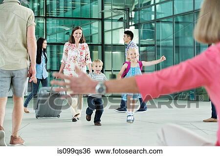 Children running excitedly towards grandmother View Large Photo Image Stock Photograph - Children running excitedly towards grandmother. Fotosearch