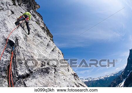Climber on rock wall, Mount Berge, Cascade Range, Washington, USA View Large Photo Image Stock Image - Climber on rock wall, Mount Berge, Cascade Range, Washington, USA. Fotosearch
