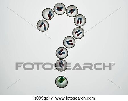 Dispenser cups of pills forming a question mark View Large Photo Image Stock Photo - Dispenser cups of pills forming a question mark. Fotosearch