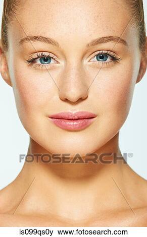 Face of a beautiful young woman View Large Photo Image Stock Photo - Face of a beautiful young woman. Fotosearch