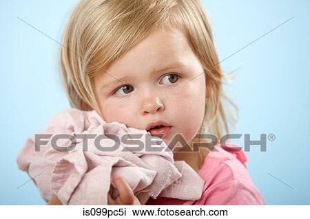 Girl holding comfort blanket View Large Photo Image Stock Image - Girl holding comfort blanket. Fotosearch