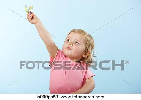 Girl holding pacifier View Large Photo Image Stock Image - Girl holding pacifier. Fotosearch