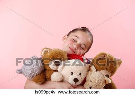 Girl hugging teddy bears View Large Photo Image Stock Photo - Girl hugging teddy bears. Fotosearch