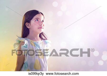 Girl looking up at lights View Large Photo Image Stock Photo - Girl looking up at lights. Fotosearch