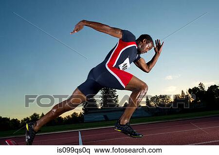 Male athlete leaving starting blocks View Large Photo Image Stock Photography - Male athlete leaving starting blocks. Fotosearch