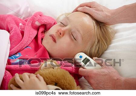 Parent taking daughter's temperature View Large Photo Image Stock Photograph - Parent taking daughter's temperature. Fotosearch