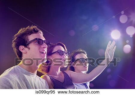 People in 3D glasses looking towards light View Large Photo Image Stock Photography - People in 3D glasses looking towards light. Fotosearch