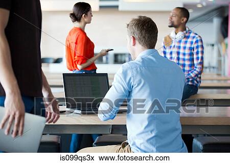 Stock Photo - People working in casual office. Fotosearch