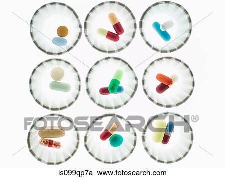 Pills in dispenser cups View Large Photo Image Stock Image - Pills in dispenser cups. Fotosearch
