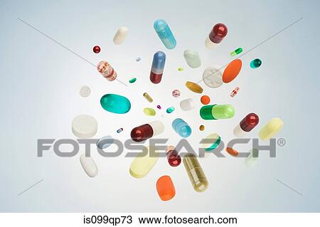 Pills, tablets and capsules in mid air View Large Photo Image Stock Image - Pills, tablets and capsules in mid air. Fotosearch