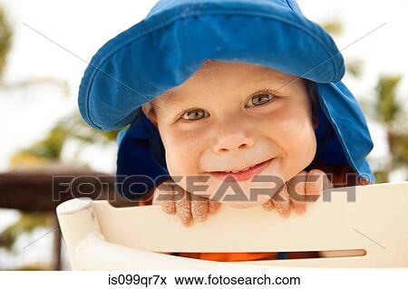 Portrait of a little boy, smiling at the camera View Large Photo Image Stock Photo - Portrait of a little boy, smiling at the camera. Fotosearch