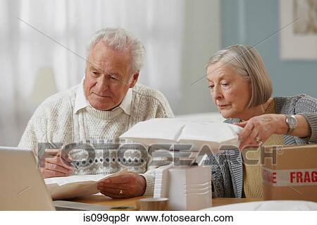 Senior couple weighing packages View Large Photo Image Stock Photography - Senior couple weighing packages. Fotosearch