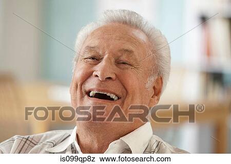 Stock Photo - Senior man laughing, portrait. Fotosearch