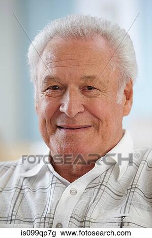 Senior man looking at camera, portrait View Large Photo Image Stock Image - Senior man looking at camera, portrait. Fotosearch