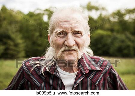 Senior man looking at camera, portrait View Large Photo Image Stock Photograph - Senior man looking at camera, portrait. Fotosearch