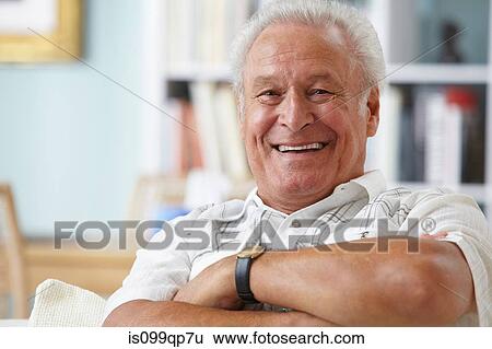 Stock Photograph - Senior man looking at camera, portrait. Fotosearch