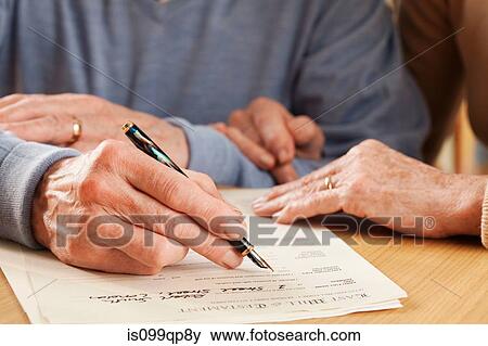 Senior man signing will View Large Photo Image Stock Photo - Senior man signing will. Fotosearch