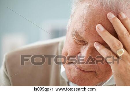 Senior man with head in hands, portrait View Large Photo Image Stock Photography - Senior man with head in hands, portrait. Fotosearch