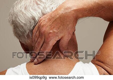 Senior man with neck ache View Large Photo Image Stock Image - Senior man with neck ache. Fotosearch