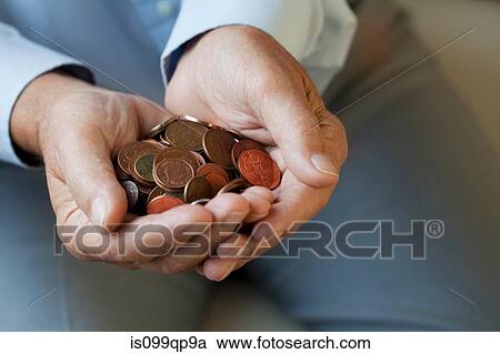 Senior woman holding coins View Large Photo Image Stock Image - Senior woman holding coins. Fotosearch