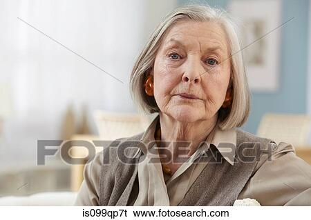 Senior woman looking at camera, portrait View Large Photo Image Stock Photograph - Senior woman looking at camera, portrait. Fotosearch