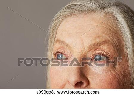 Senior woman looking away View Large Photo Image Stock Photograph - Senior woman looking away. Fotosearch