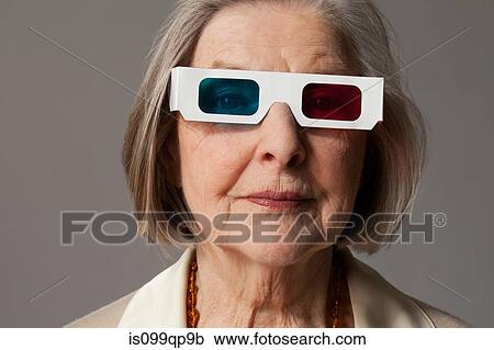 Senior woman wearing 3d glasses View Large Photo Image Stock Image - Senior woman wearing 3d glasses. Fotosearch