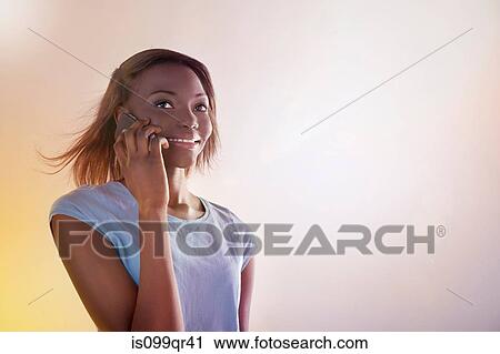 Teenage girl using cellphone View Large Photo Image Stock Image - Teenage girl using cellphone. Fotosearch