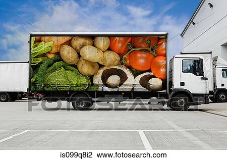 Truck with vegetables parked outside distribution warehouse View Large Photo Image Stock Image - Truck with vegetables parked outside distribution warehouse. Fotosearch