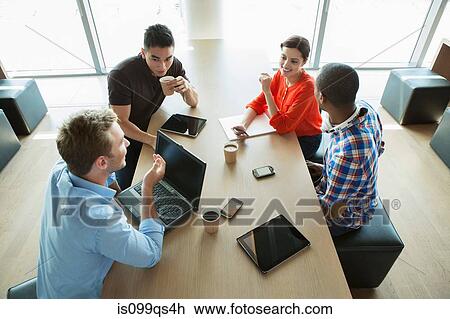Young business people in meeting View Large Photo Image Stock Image - Young business people in meeting. Fotosearch
